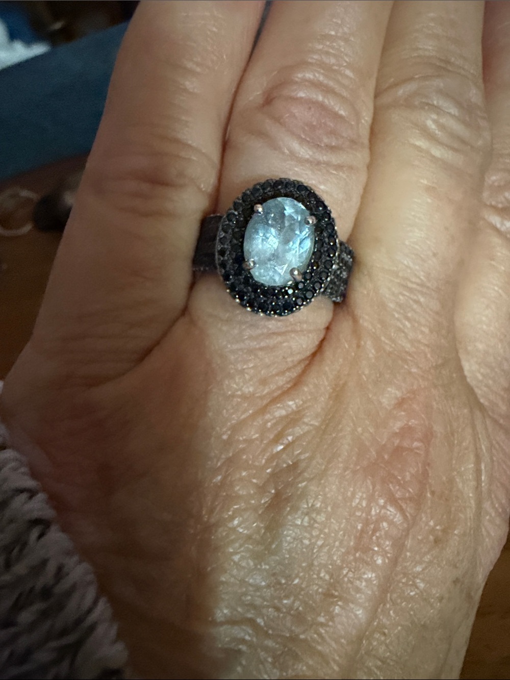 Oval Aquamarine Centerstone Ring with Black Pavé Black Spinel Halo Ring